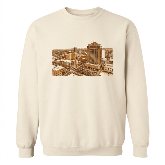 Ivory Above Billings Warm Tones sweatshirt with cityscape print on a white background
