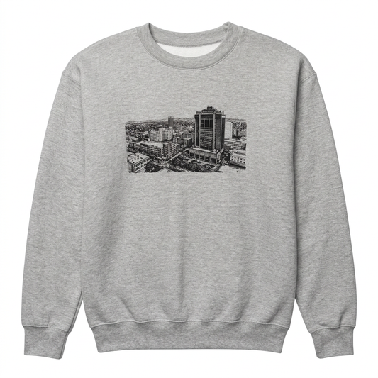 Heather gray Above Billings crewneck sweatshirt with black cityscape print on a white background